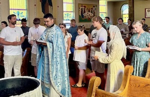 Photos from the baptism service, where we welcomed six new members to the church
